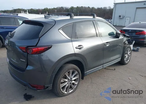 2021 Mazda Cx-5 Grand Touring z USA, uszkodzony, nr VIN JM3KFBDM5M0469257